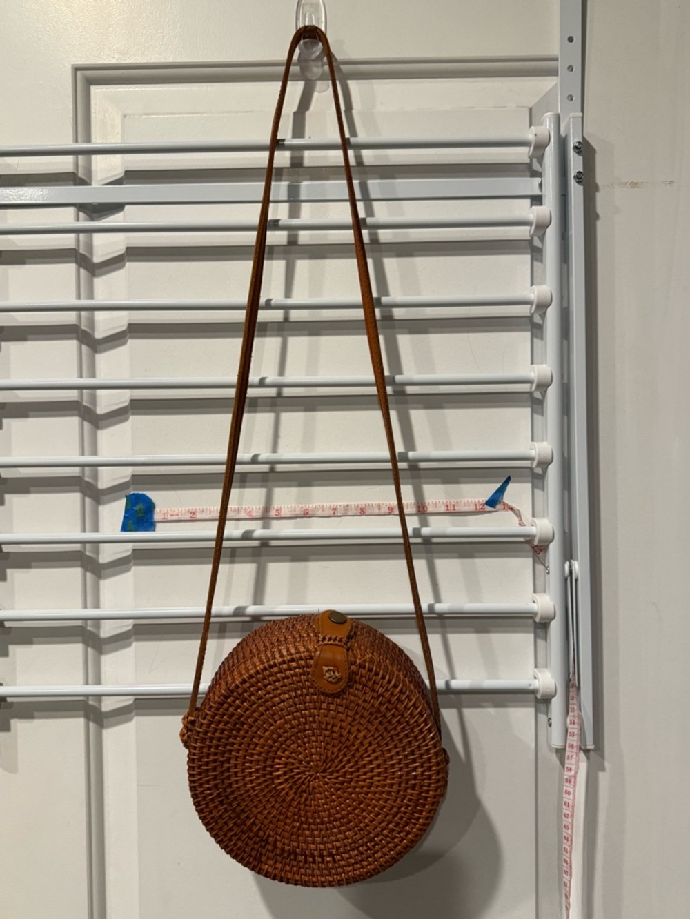 Round Woven Crossbody Bag in Brown